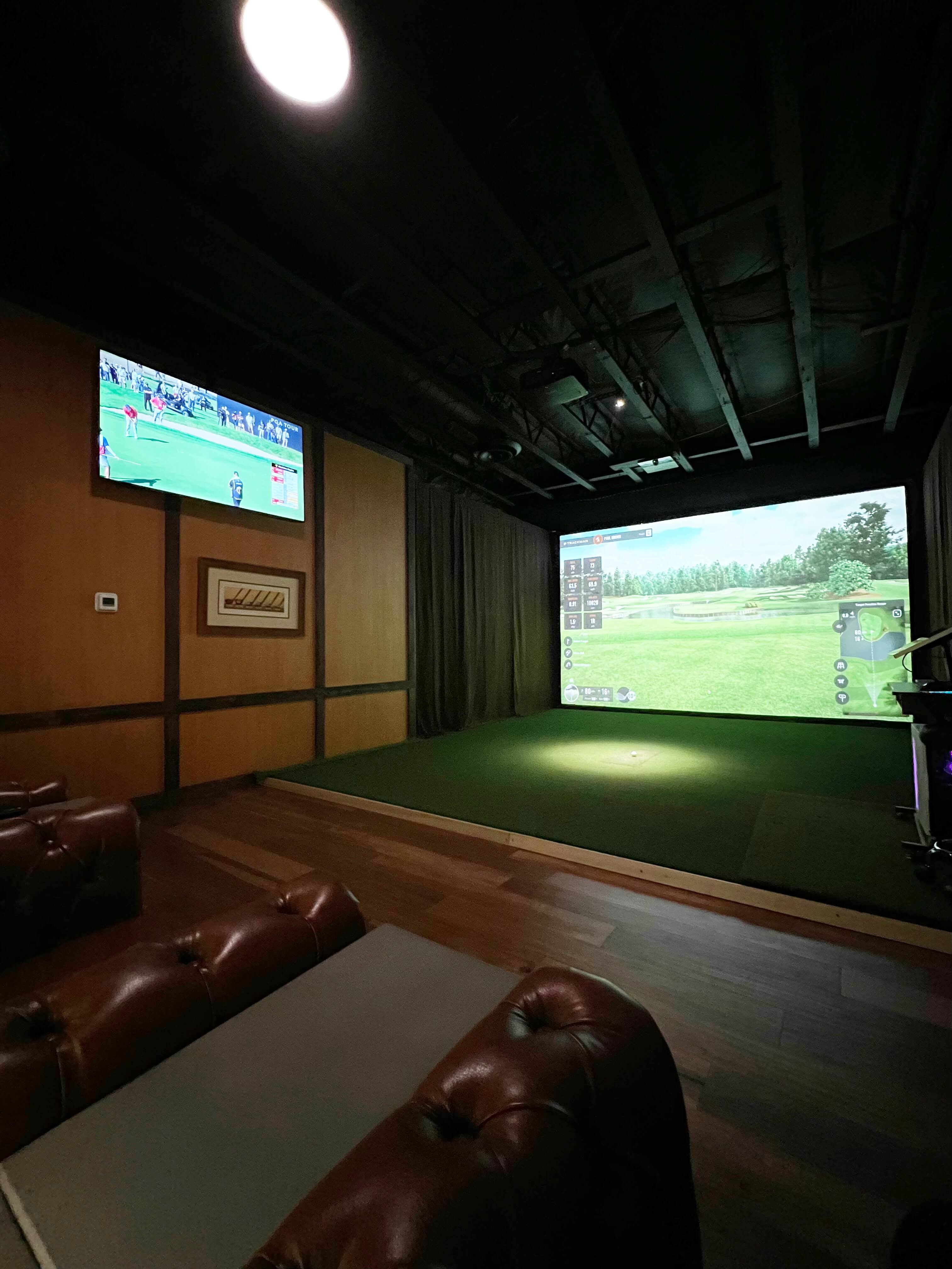 TrackMan golf simulator bay at The Clubhouse AZ in Phoenix, Arizona